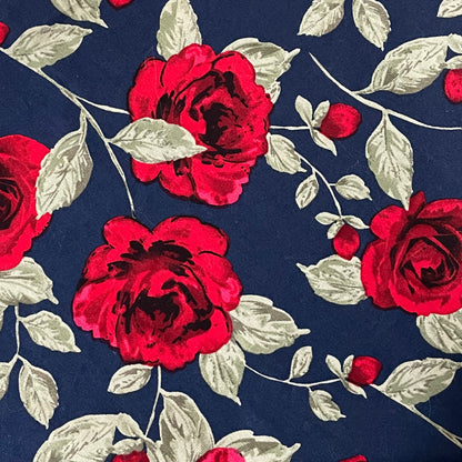 navy blue fabric with printed red roses 